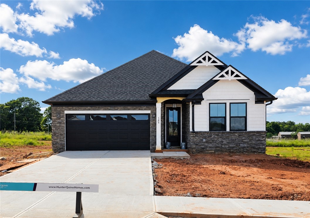 188 Tiger Lily Drive Anderson, SC 29621 - Photo 1 of 25 Crafted with elegant stone and siding, this new construction home welcomes you with modern curb appeal.