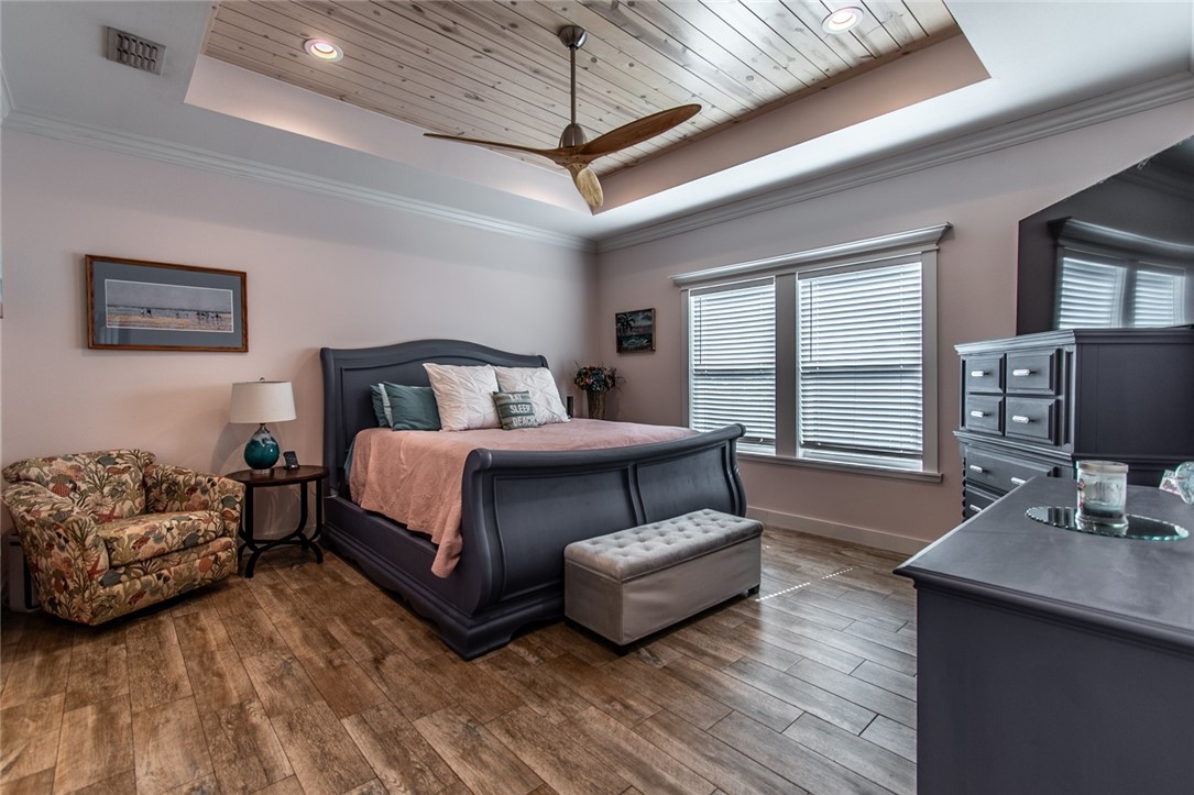 15422 Dyna Street Corpus Christi, TX 78418 - Photo 18 of 40 a bedroom with furniture and a large window