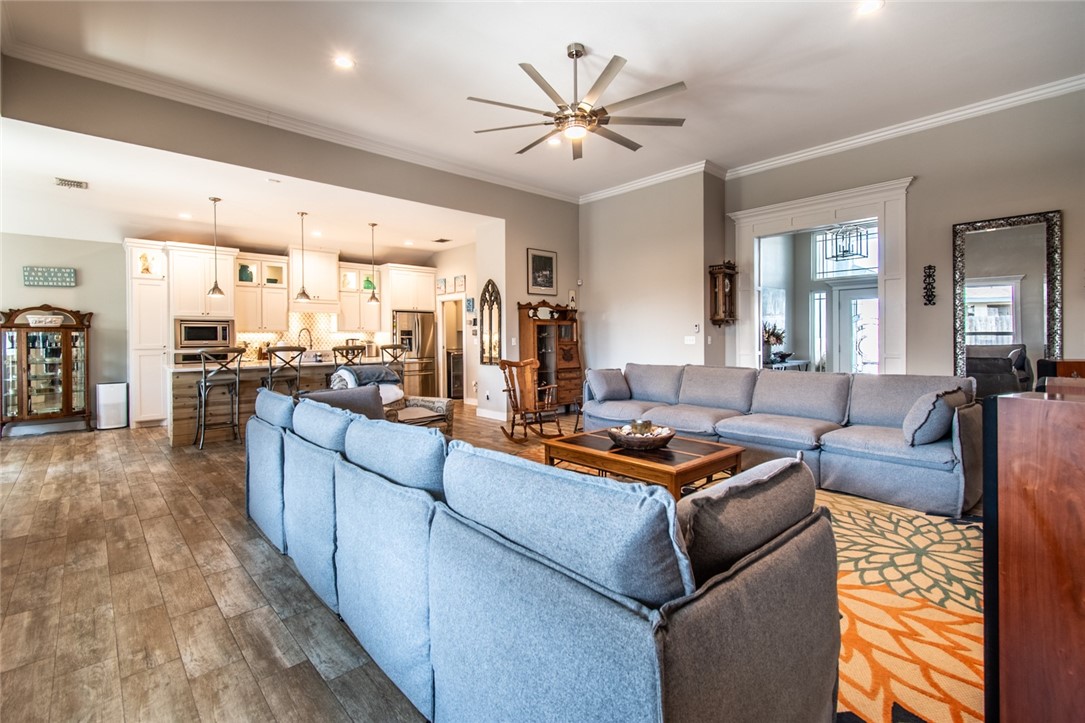 15422 Dyna Street Corpus Christi, TX 78418 - Photo 36 of 40 a living room with furniture kitchen view and a large window