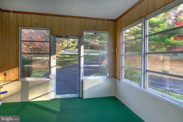 a view of porch with a back yard