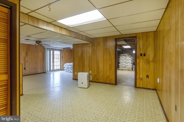 a bathroom with a double vanity sink and mirror