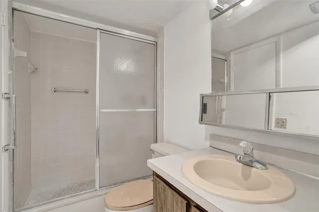 a view of a street from a balcony