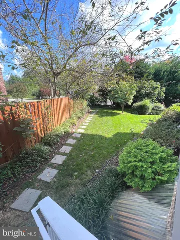 a view of a yard with an trees
