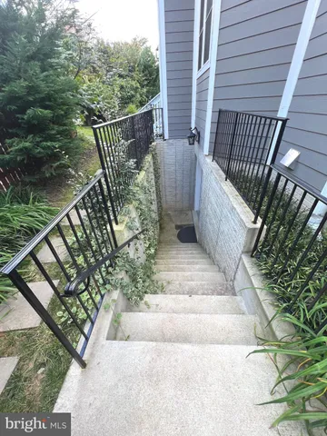 a view of a balcony with wooden floor