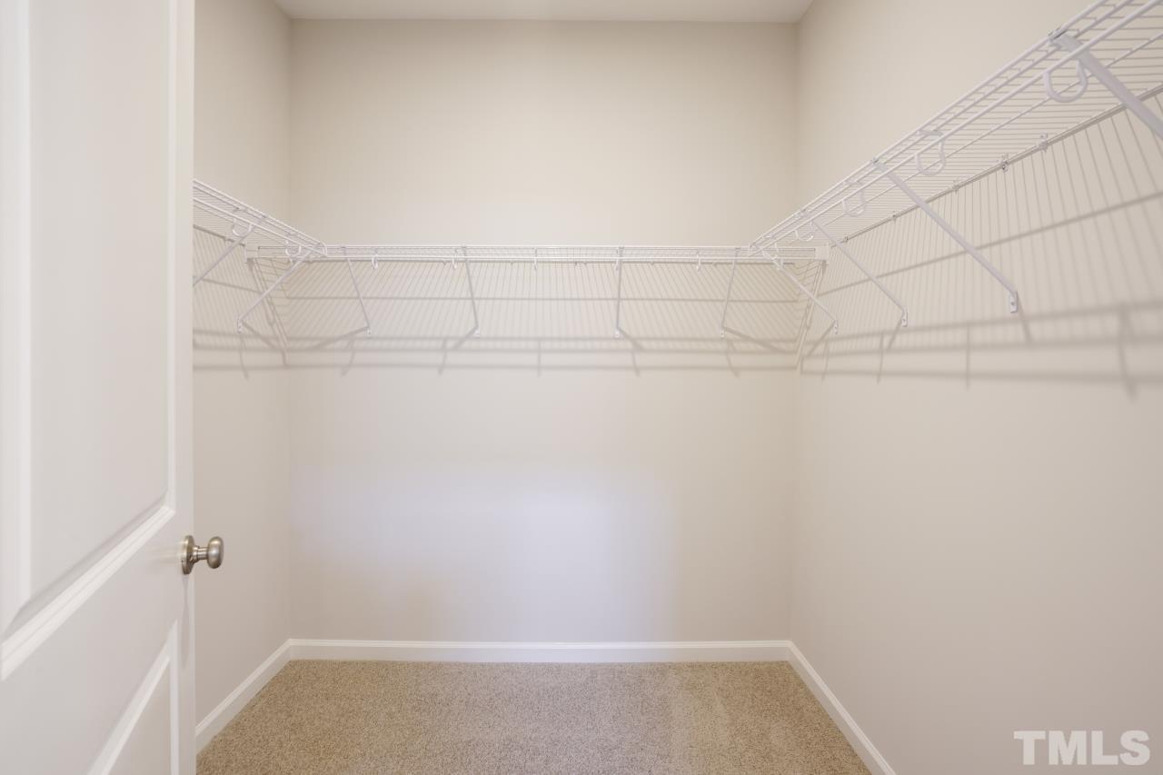 393 Madden Rose Loop Garner, NC 27529 - Photo 21 of 31 a view of a room