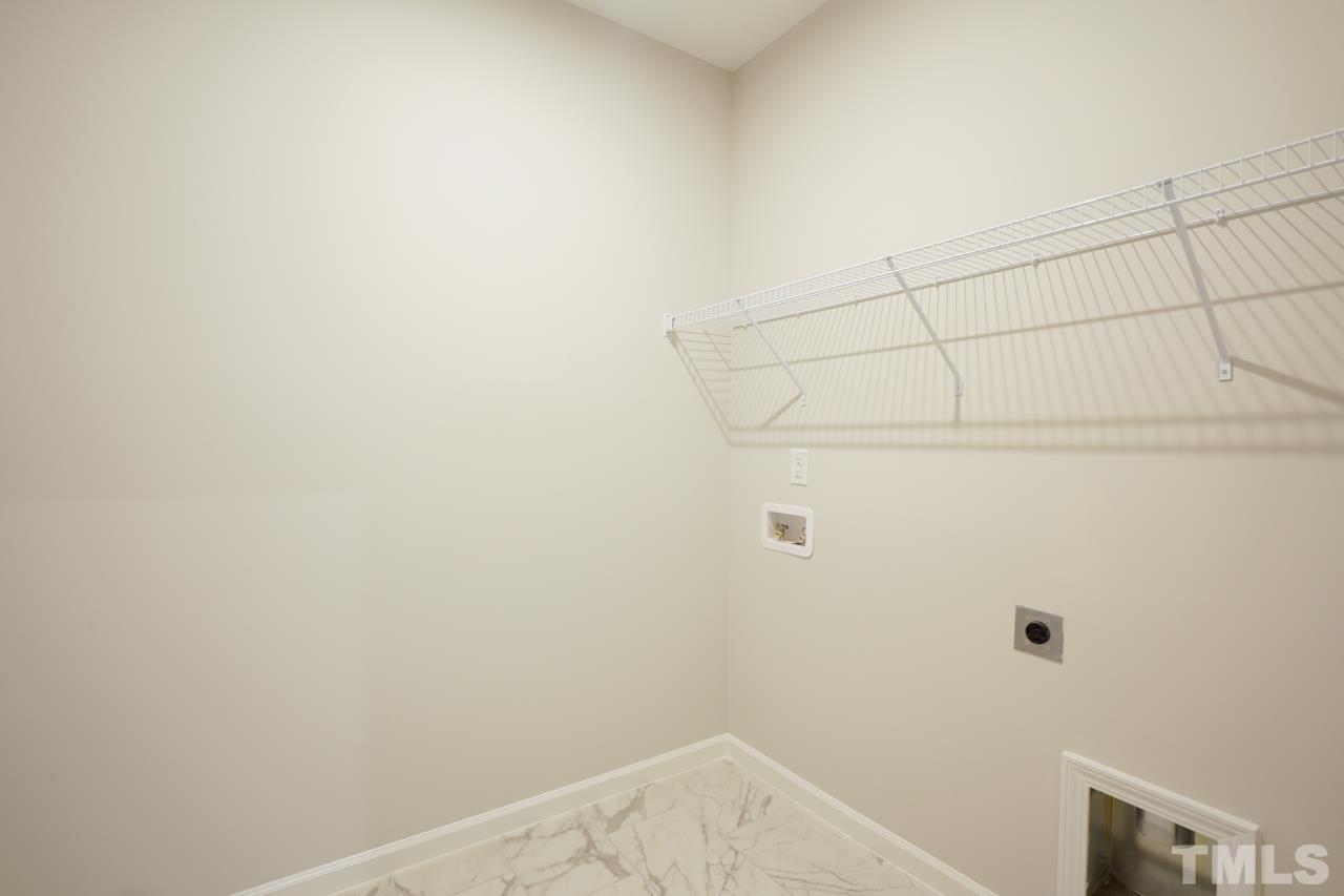 393 Madden Rose Loop Garner, NC 27529 - Photo 23 of 31 a view of a closet