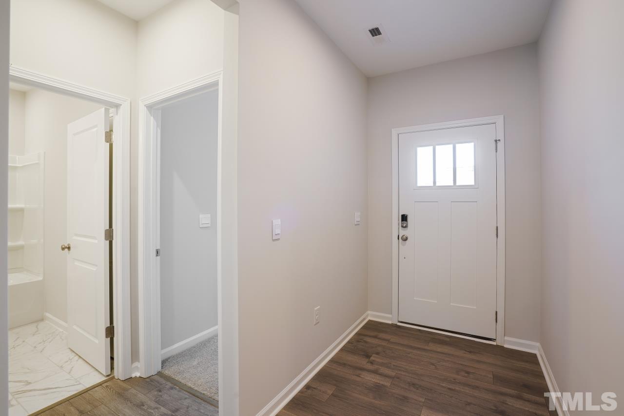 393 Madden Rose Loop Garner, NC 27529 - Photo 8 of 31 a view of empty room
