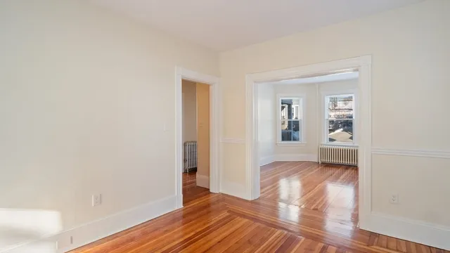 a view of livingroom with wooden floor