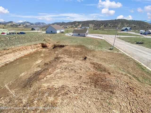 a view of an ocean and a mountain
