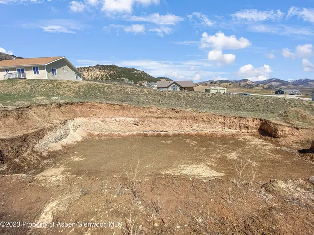 a view of a lake with a city
