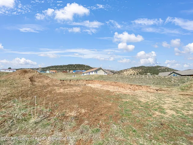 a view of an ocean and a yard