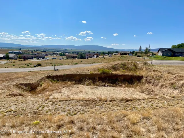 a view of a yard with an ocean
