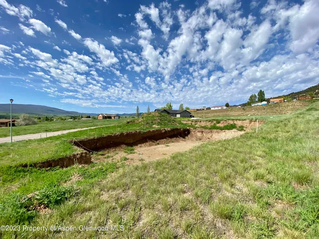 a view of a lake with a mountain