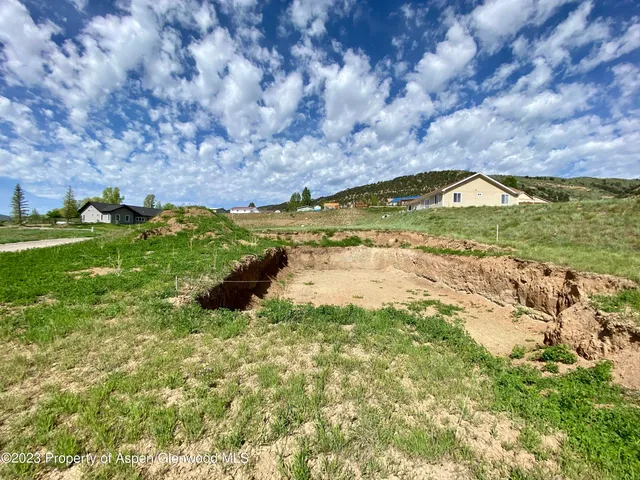 a view of a lake with a beach