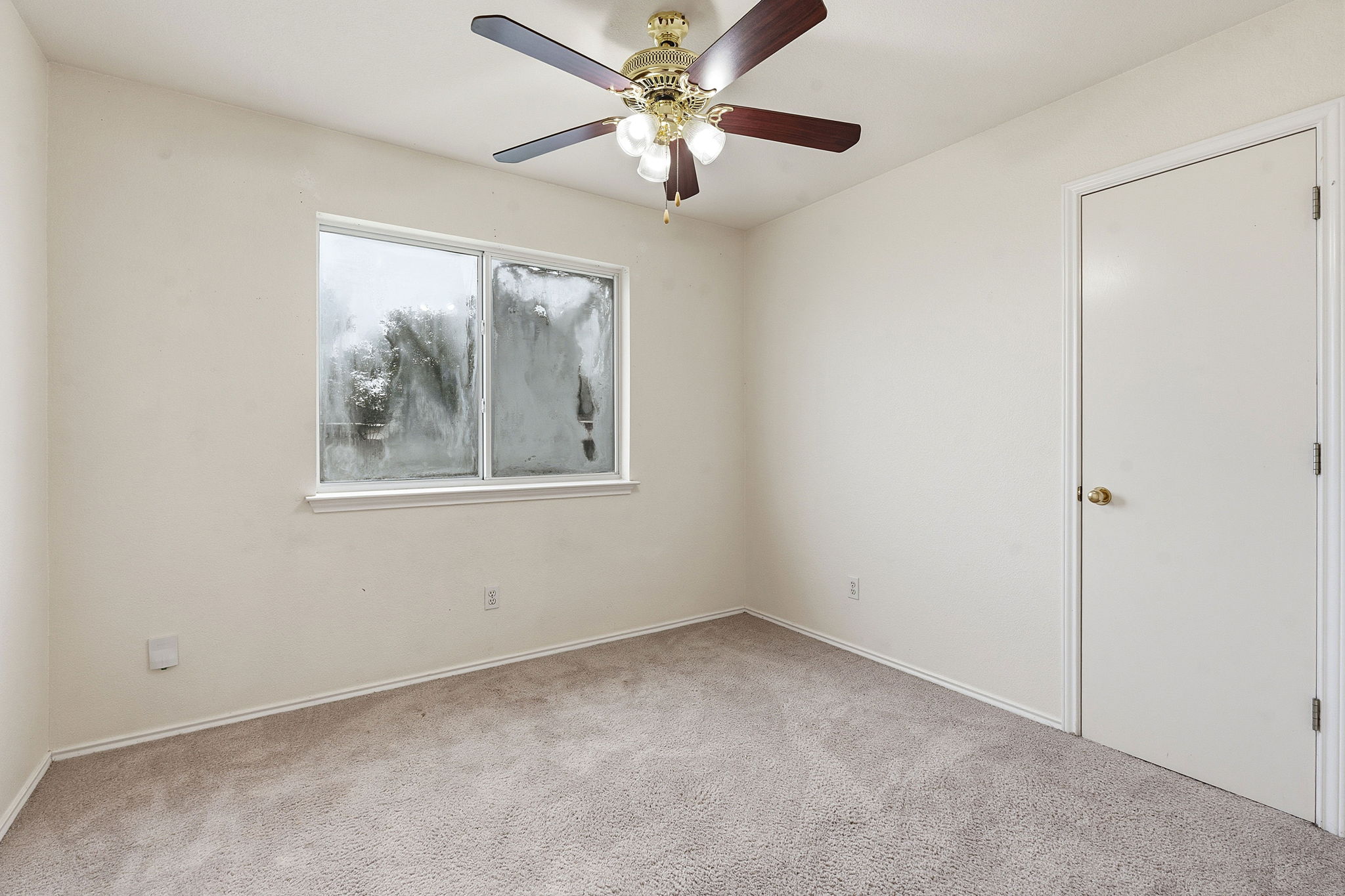 116 Blue Ridge Trail Elgin, TX 78621 - Photo 21 of 28 a view of an empty room with a window