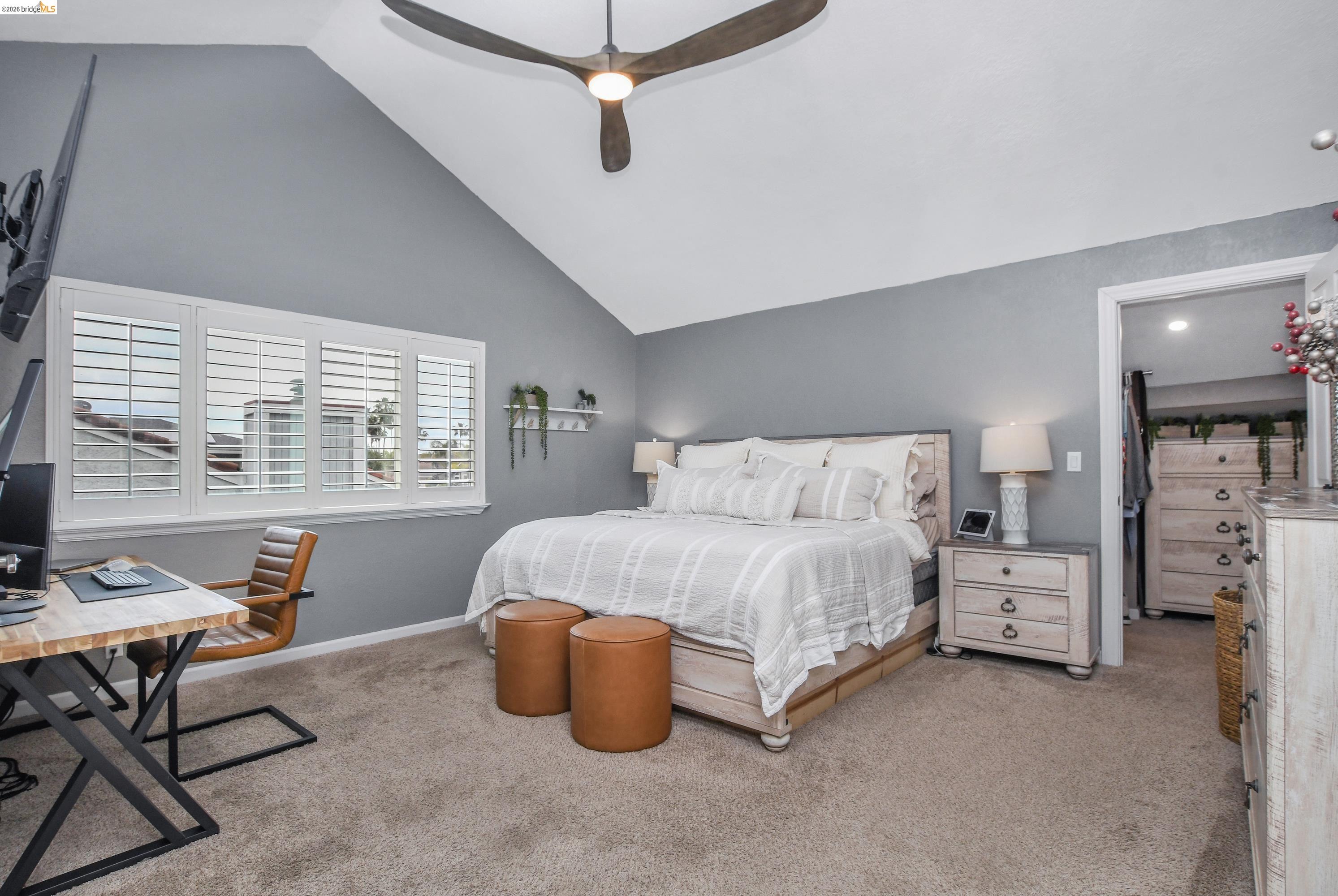1432 Willow Lake Road Discovery Bay, CA 94505 - Photo 27 of 40 Carpeted bedroom featuring a vaulted ceiling with a ceiling fan