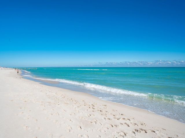 a view of a beach with an ocean view