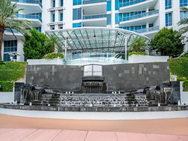 a front view of a building with glass windows