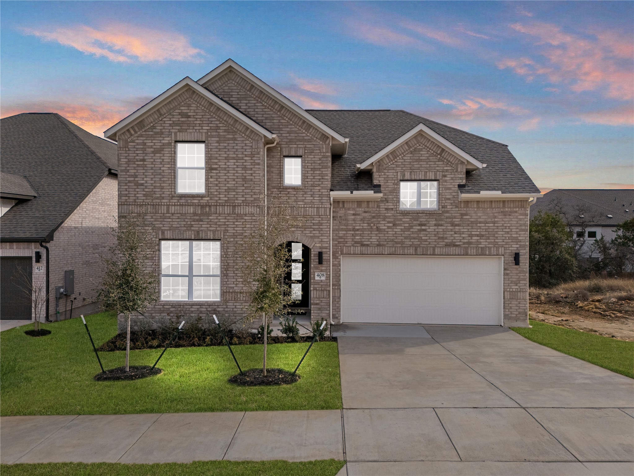408 Texas Drive Georgetown, TX 78628 - Photo 1 of 39 a front view of a house with a yard