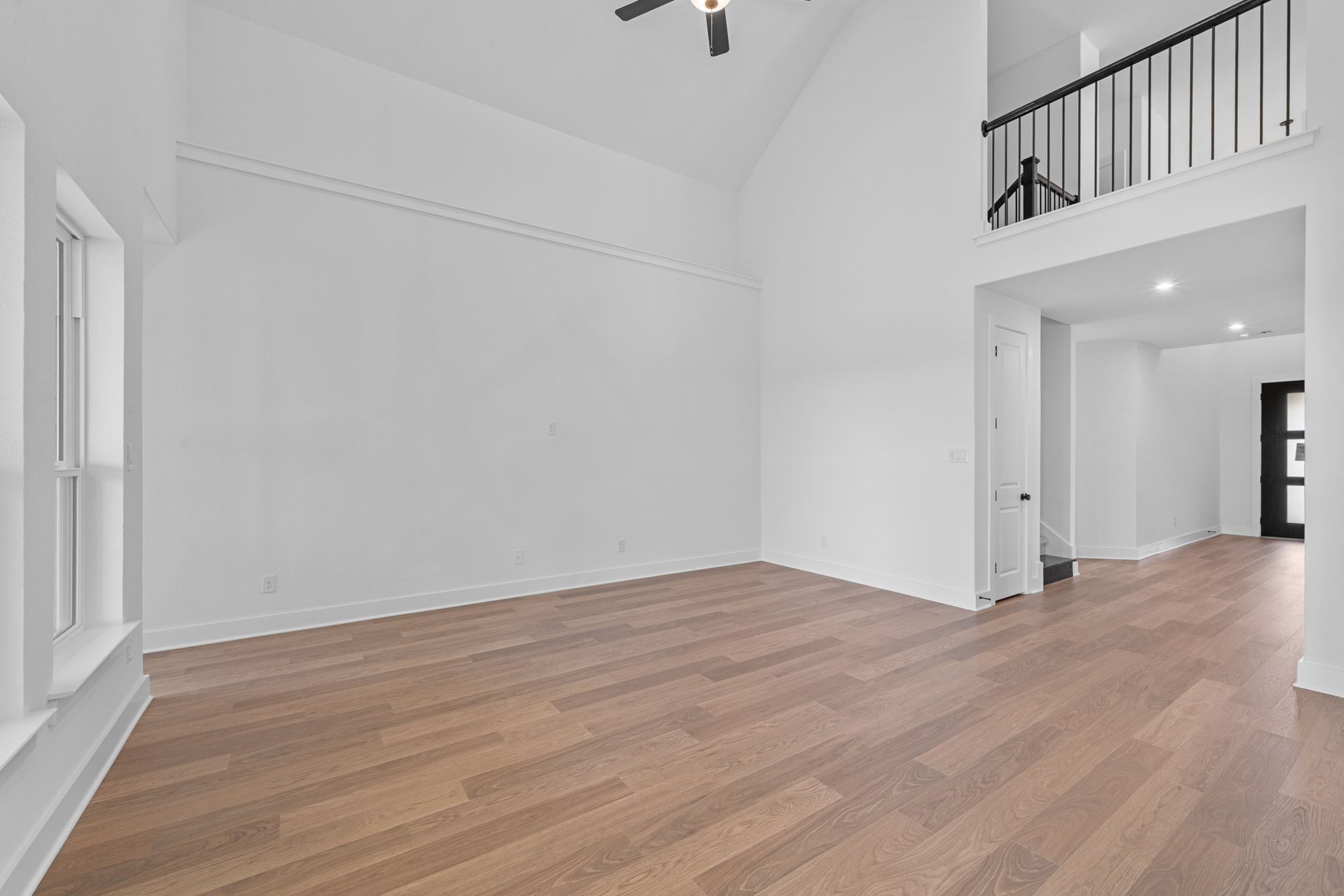 408 Texas Drive Georgetown, TX 78628 - Photo 16 of 39 a view of an empty room with wooden floor