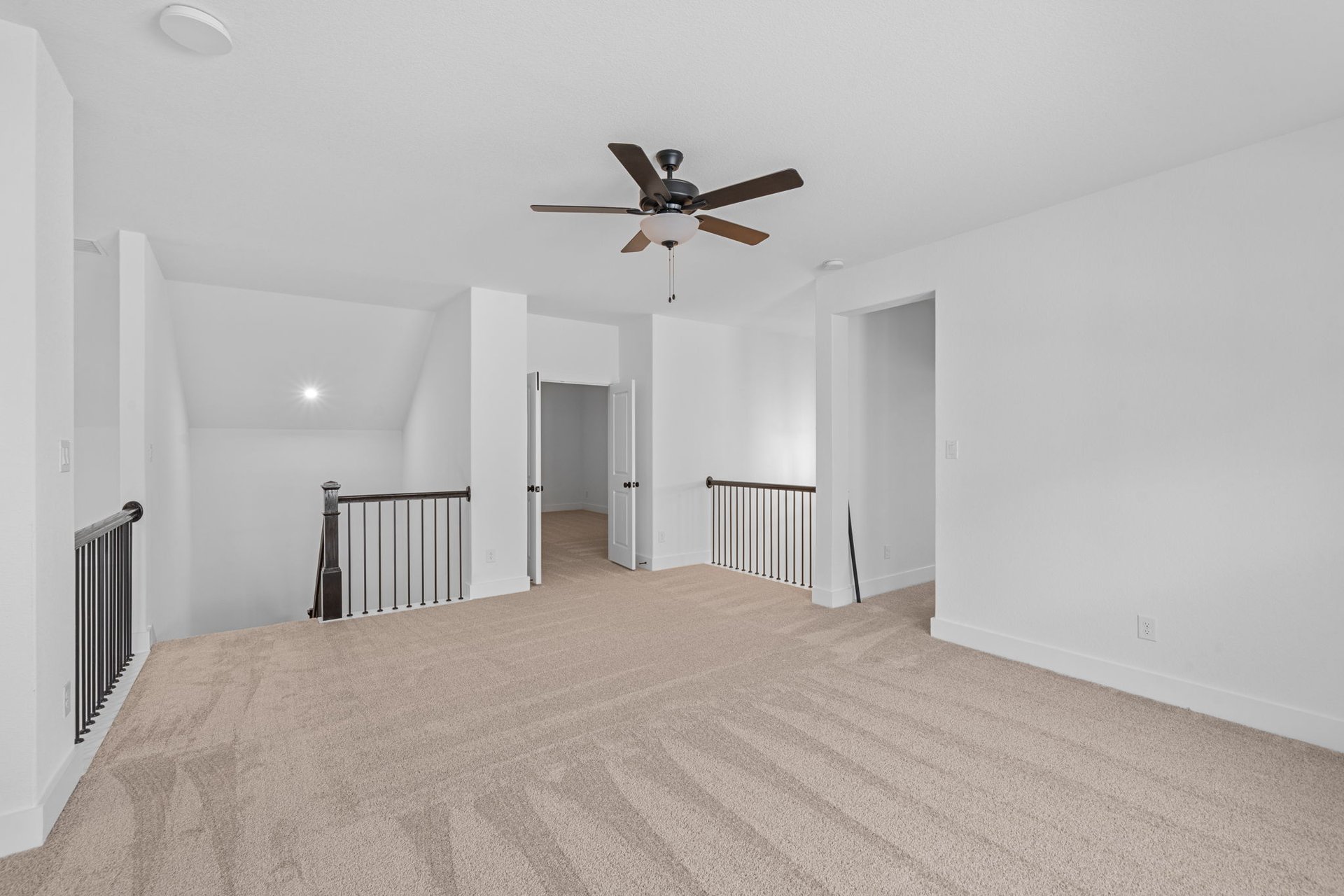 408 Texas Drive Georgetown, TX 78628 - Photo 24 of 39 a view of a livingroom with a ceiling fan & windows