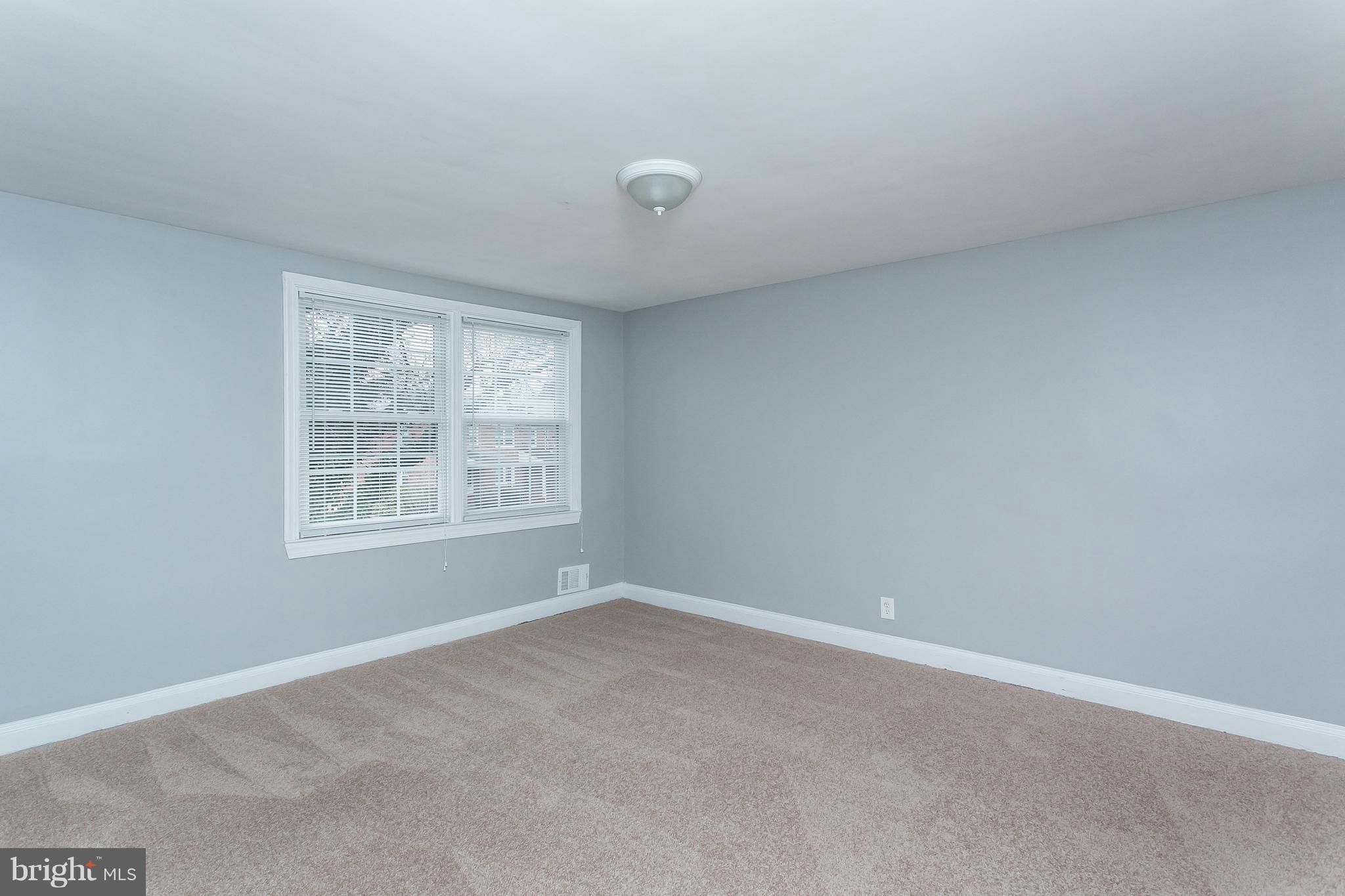 1033 Reverdy Road Baltimore, MD 21212 - Photo 15 of 29 an empty room with windows