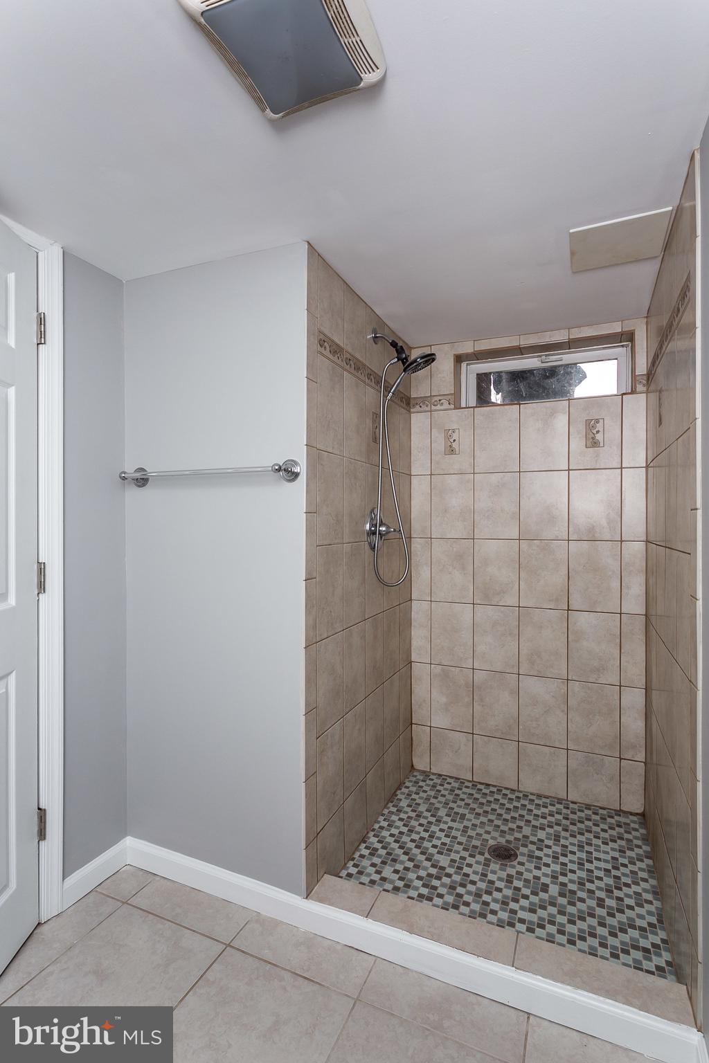 1033 Reverdy Road Baltimore, MD 21212 - Photo 27 of 29 a bathroom with a shower