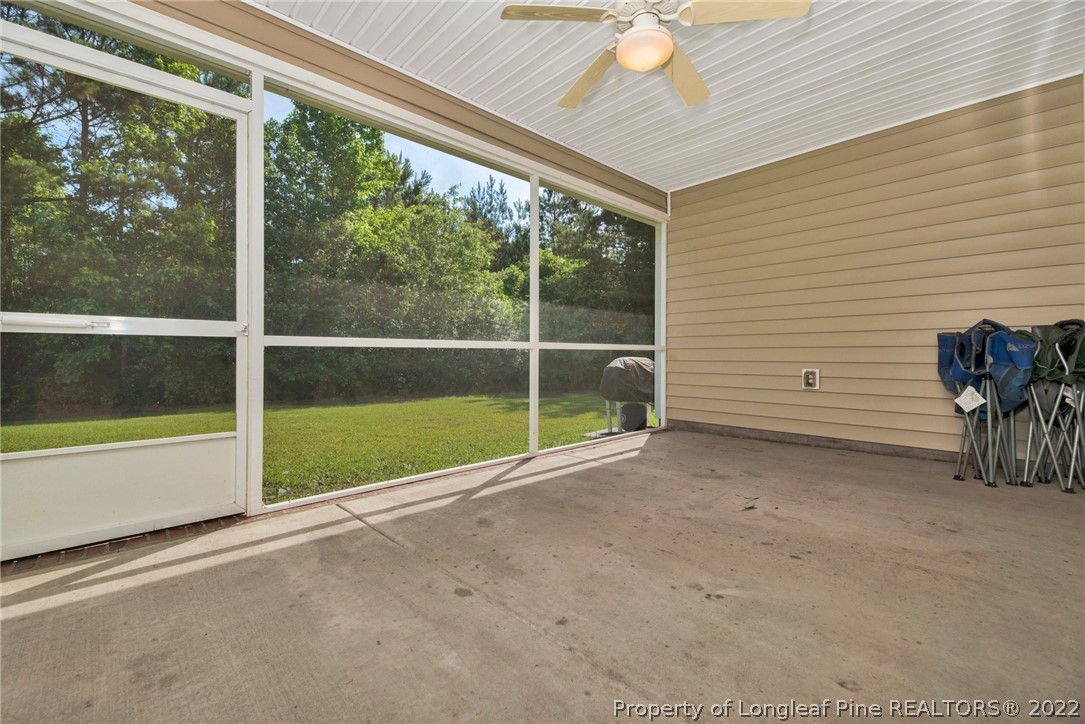 723 Cape Fear Road Raeford, NC 28376 - Photo 11 of 33 a view of a room with wooden floor and windows