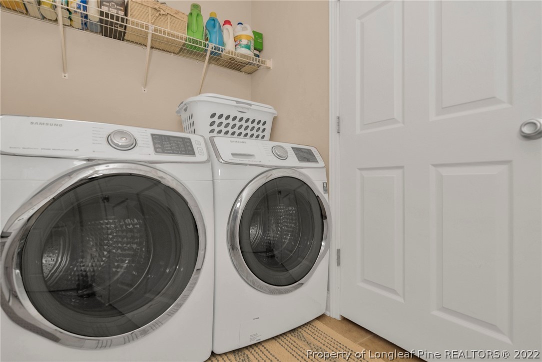 723 Cape Fear Road Raeford, NC 28376 - Photo 19 of 33 a utility room with dryer and washer