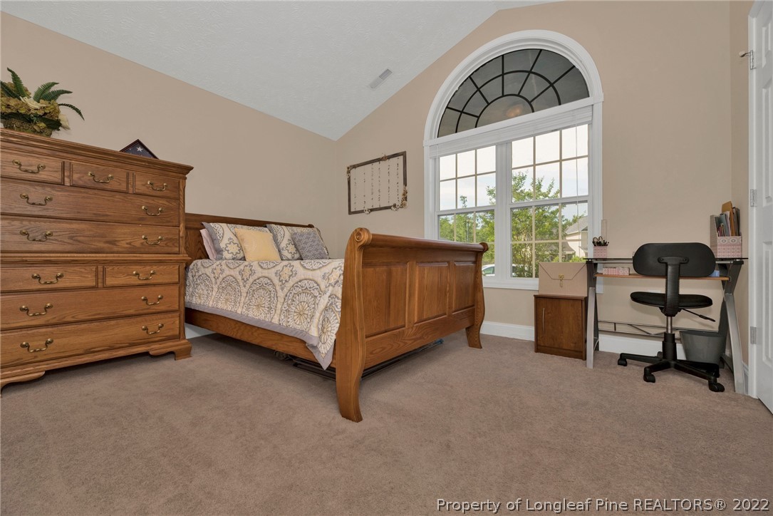 723 Cape Fear Road Raeford, NC 28376 - Photo 20 of 33 a bedroom with a bed and a window