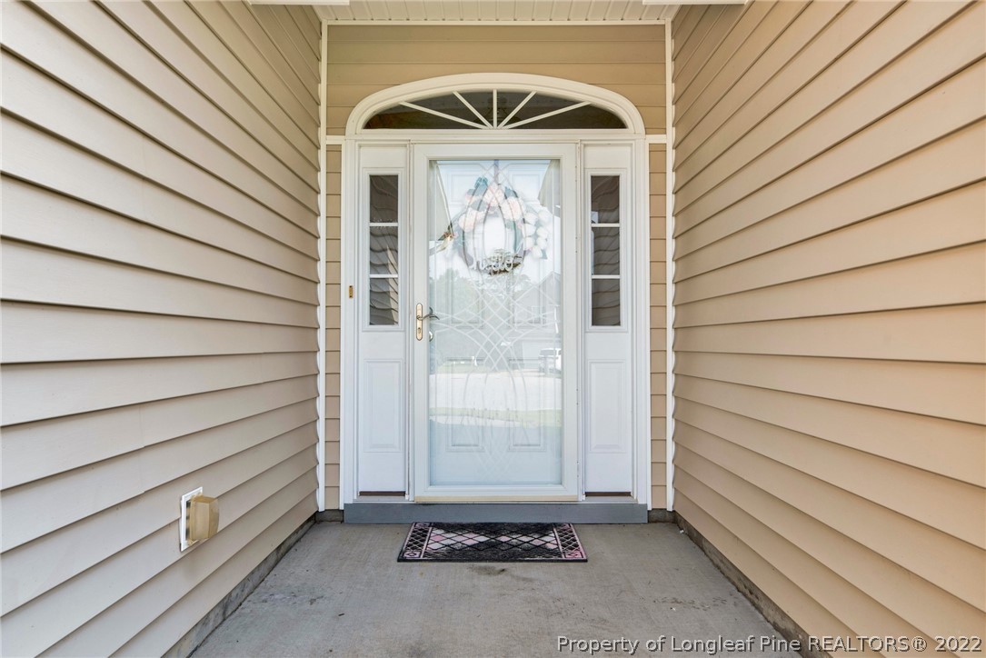 723 Cape Fear Road Raeford, NC 28376 - Photo 5 of 33 a front view of a house with entryway