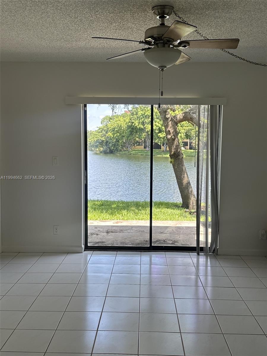 10003 Winding Lake Road, Unit 103 Sunrise, FL 33351 - Photo 2 of 12 a view of a room with window