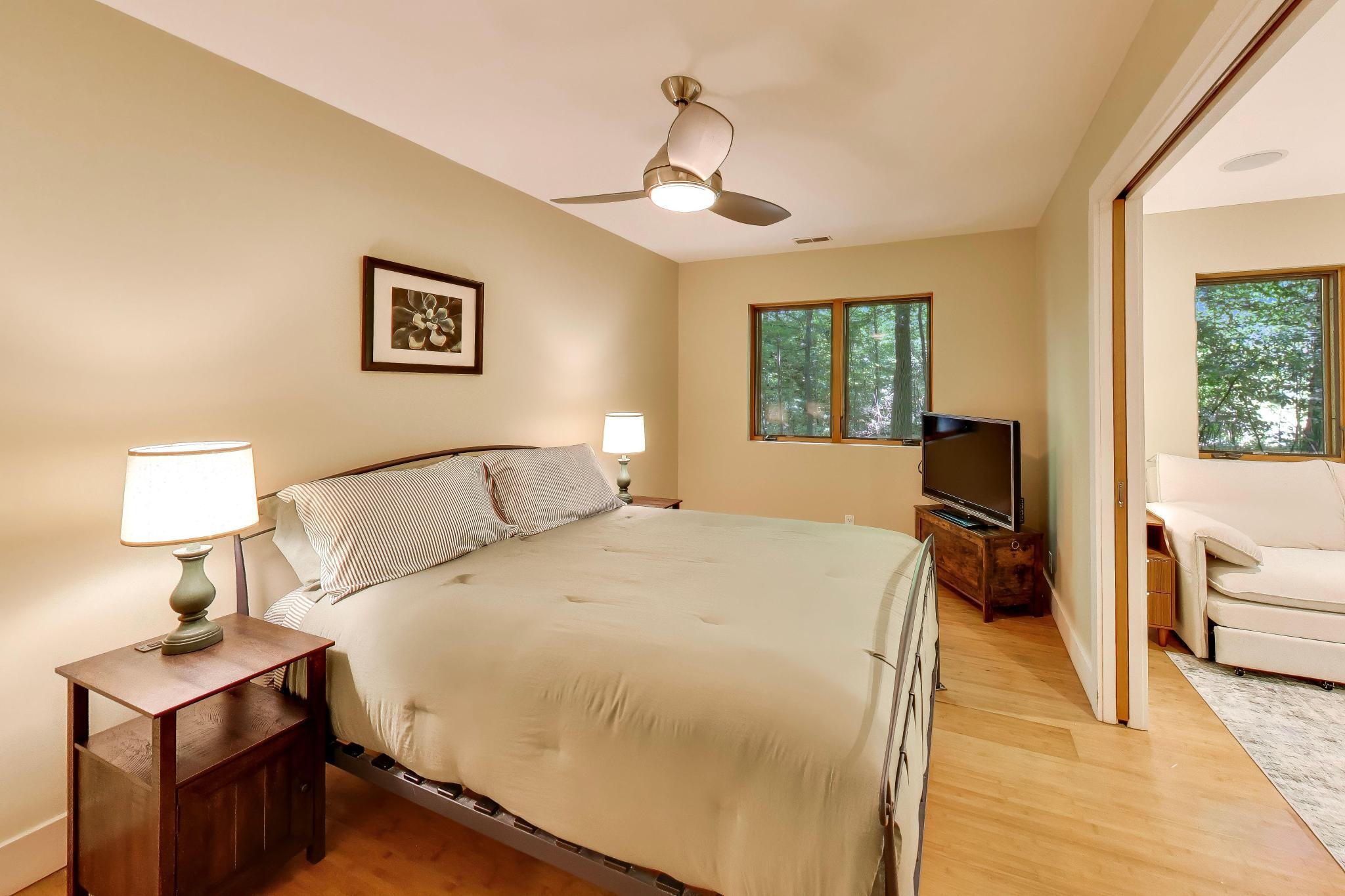 44 Tryon Farm Lane Michigan City, IN 46360 - Photo 10 of 37 a spacious bedroom with a bed and a table
