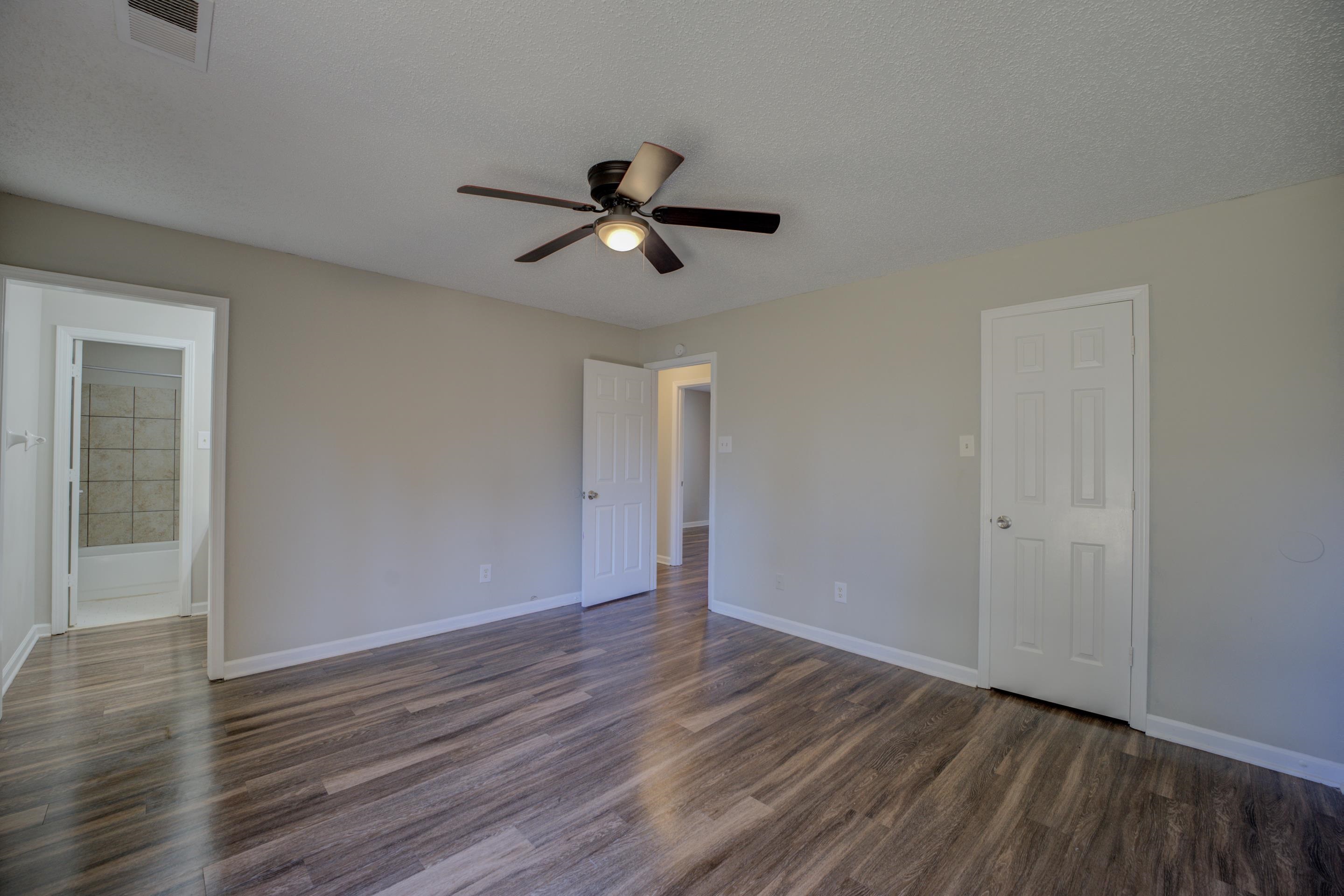 3501 Chowning Road Memphis, TN 38135 - Photo 18 of 25 Spare room with dark wood-type flooring, ceiling fan, and a textured ceiling
