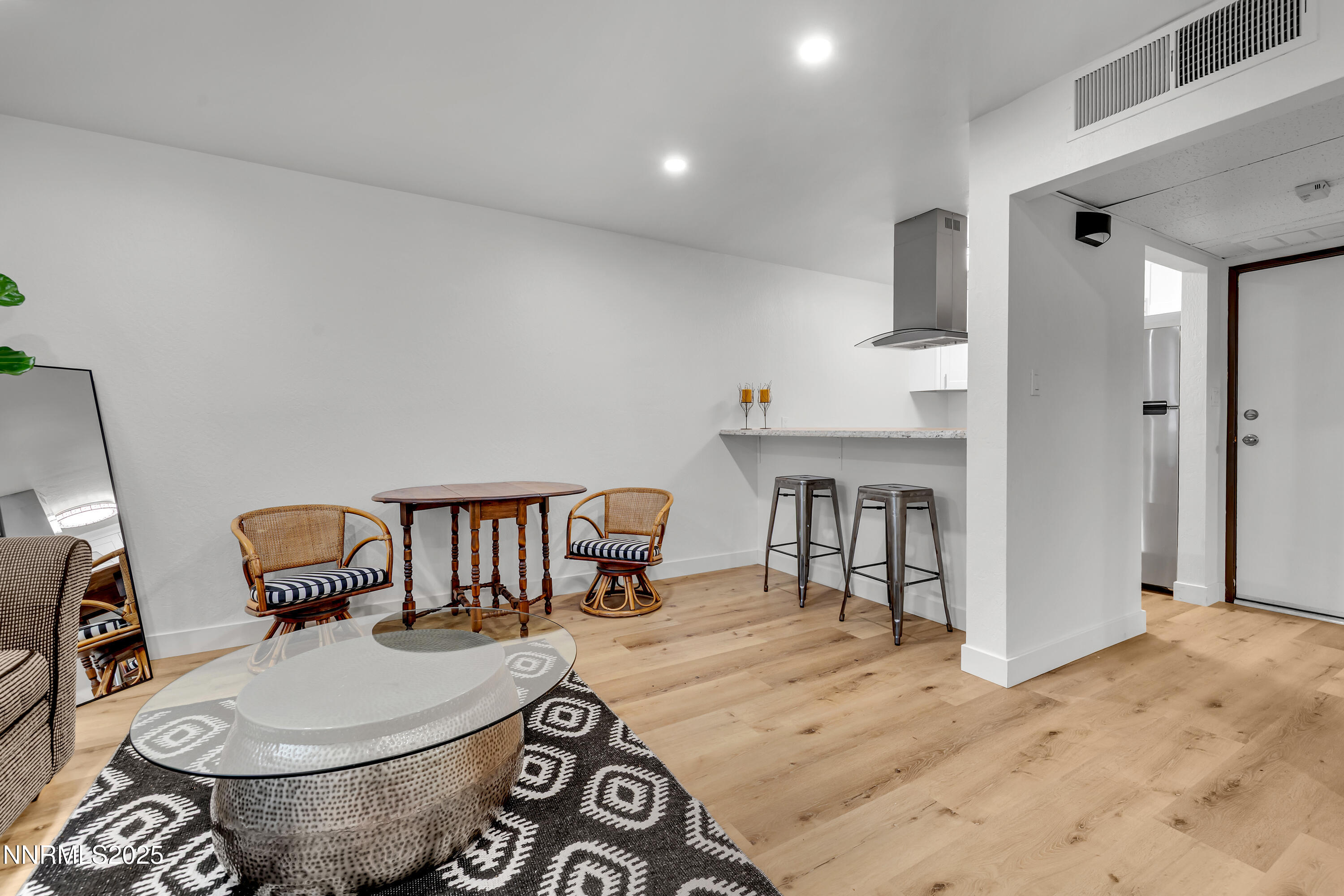 1000 Beck Drive, Unit 163 Reno, NV 89509 - Photo 11 of 14 a living room with furniture a table and chairs