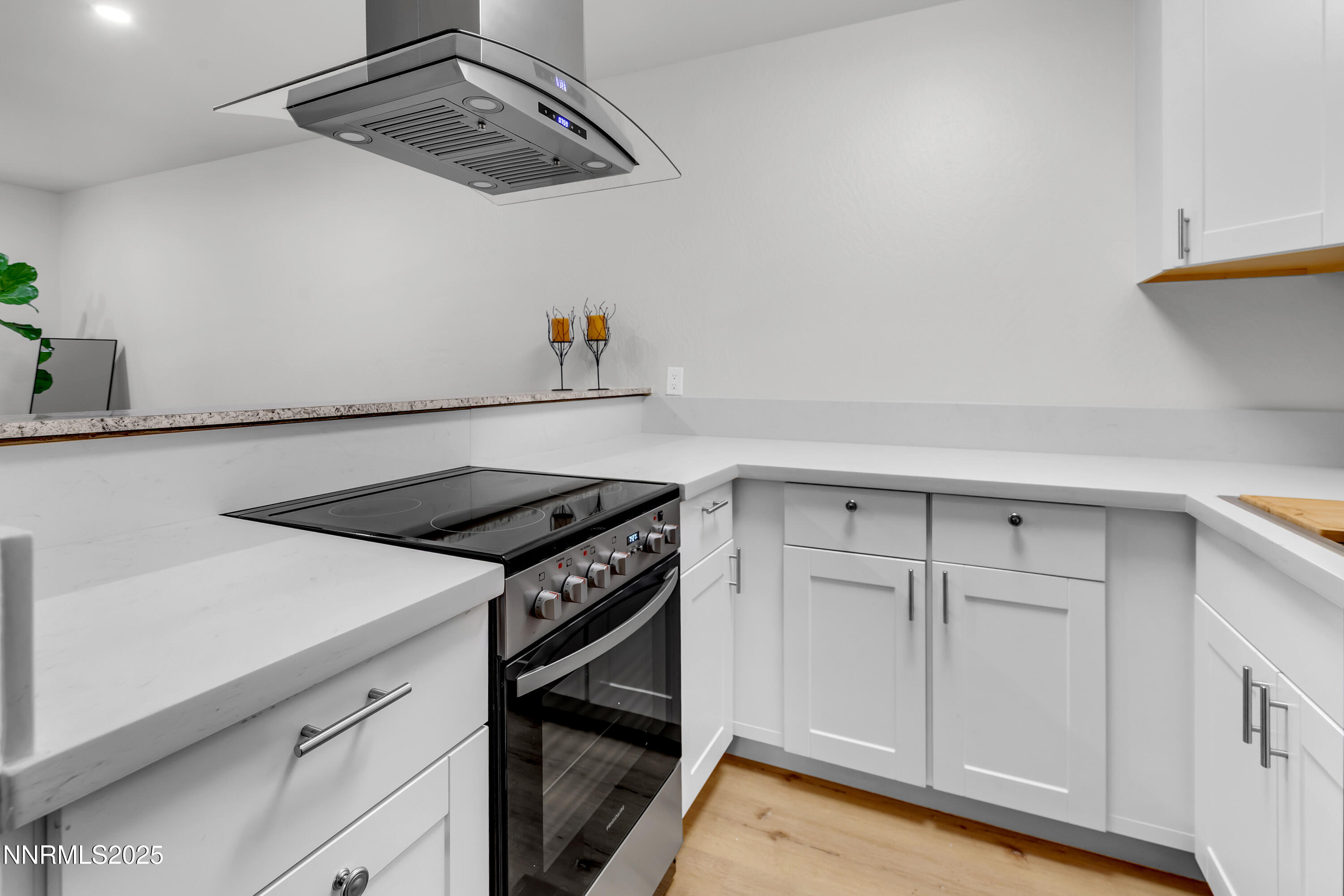 1000 Beck Drive, Unit 163 Reno, NV 89509 - Photo 6 of 14 a stove top oven sitting inside of a kitchen