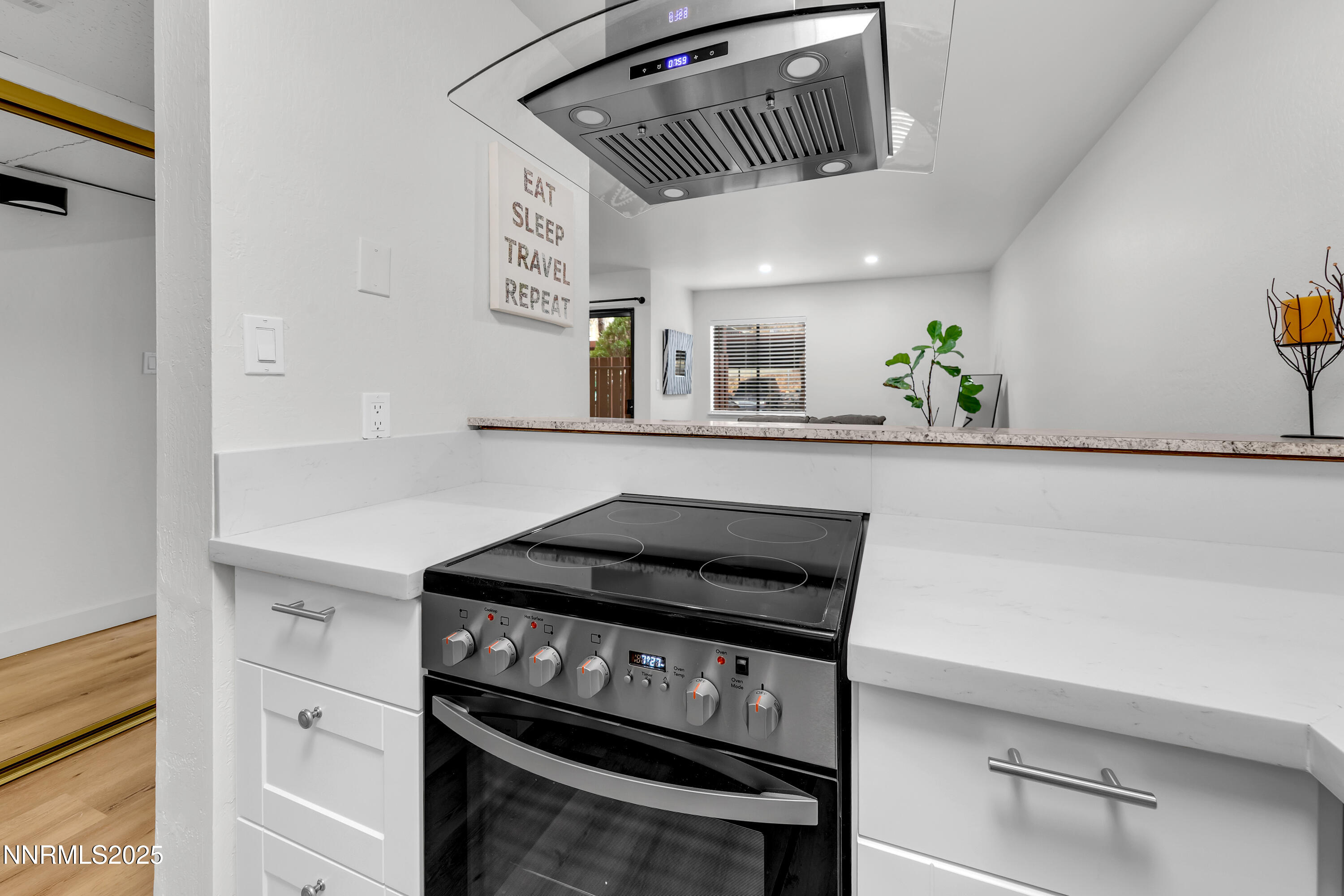 1000 Beck Drive, Unit 163 Reno, NV 89509 - Photo 8 of 14 a kitchen with granite countertop cabinets and stove top oven