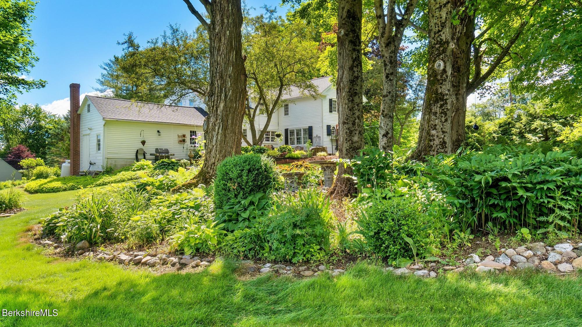 500 Devon Road Lee, MA 01238 - Photo 18 of 59 a view of a house with a yard