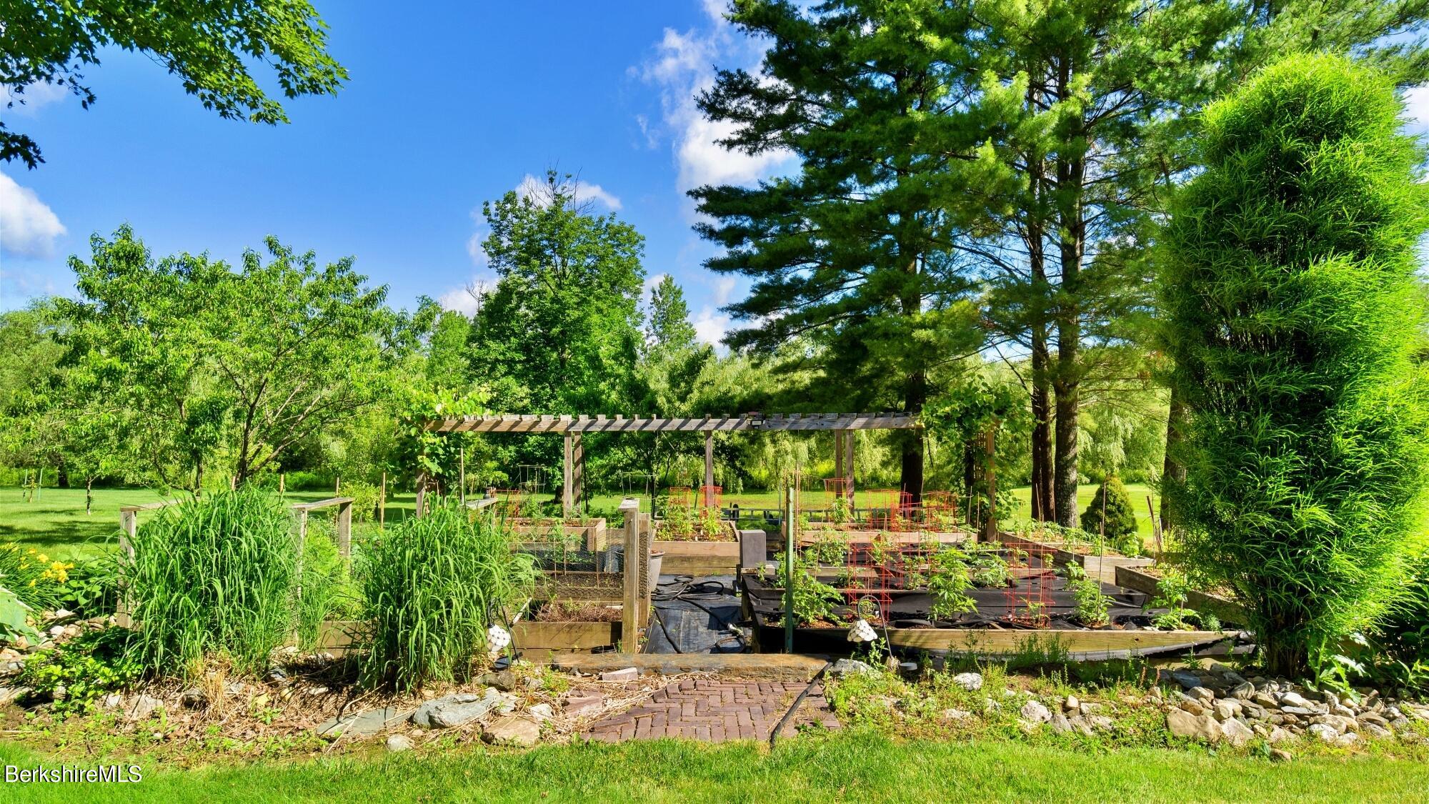 500 Devon Road Lee, MA 01238 - Photo 23 of 59 a view of backyard with outdoor seating and green space