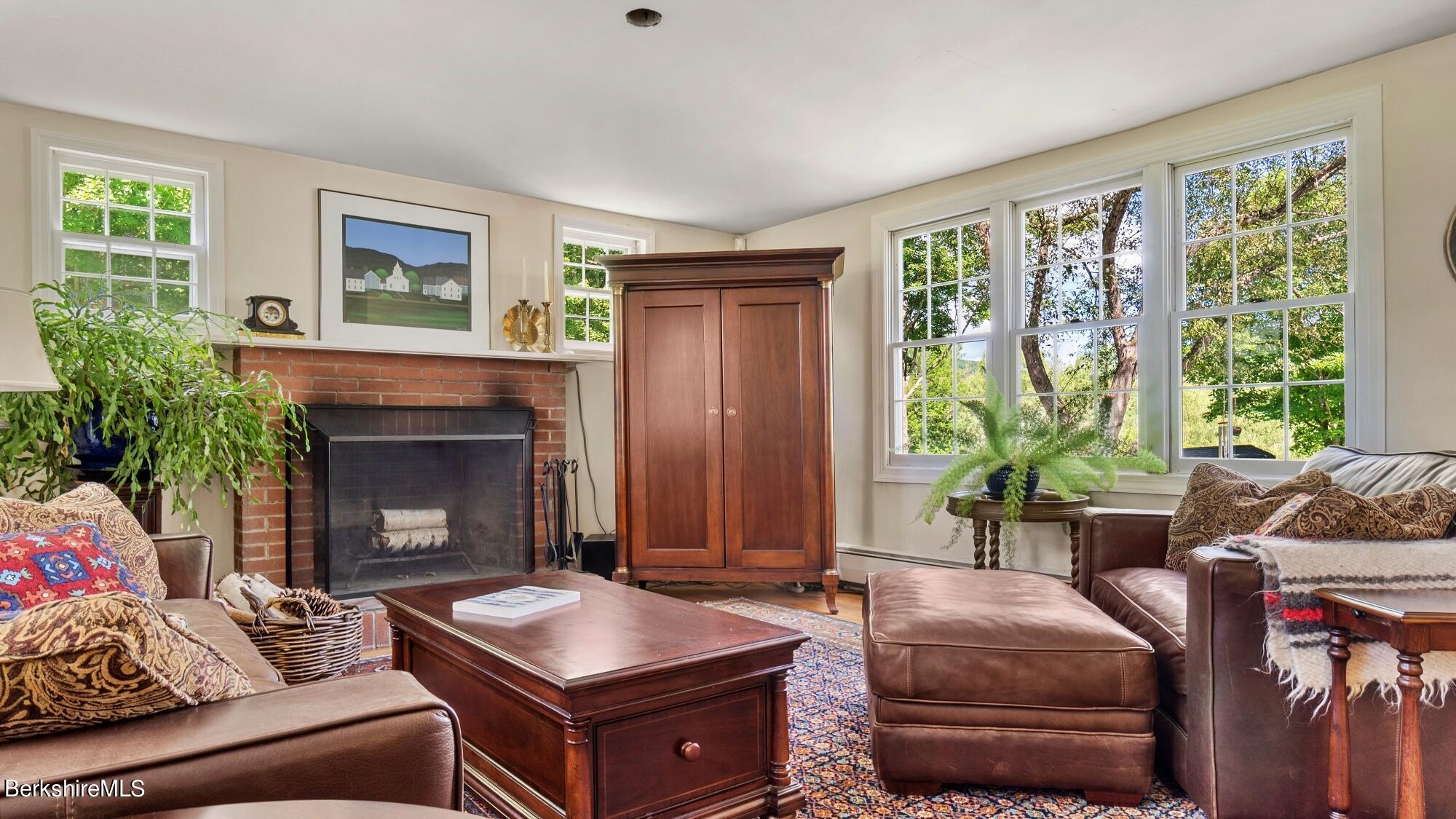500 Devon Road Lee, MA 01238 - Photo 35 of 59 a living room with furniture and a fireplace