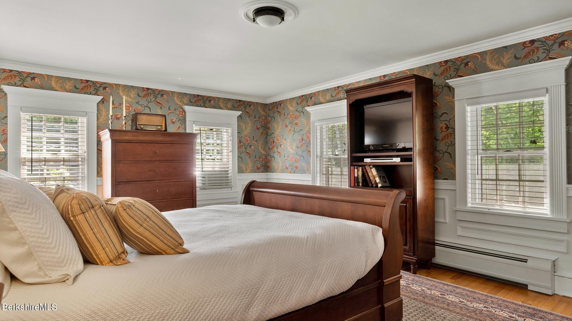 500 Devon Road Lee, MA 01238 - Photo 51 of 59 a bedroom with a bed and a television