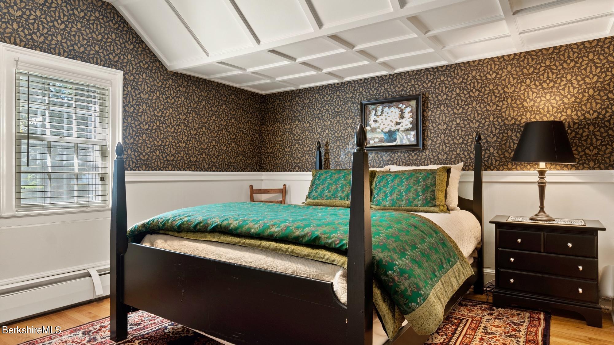 500 Devon Road Lee, MA 01238 - Photo 55 of 59 a bed room with a bed and a television