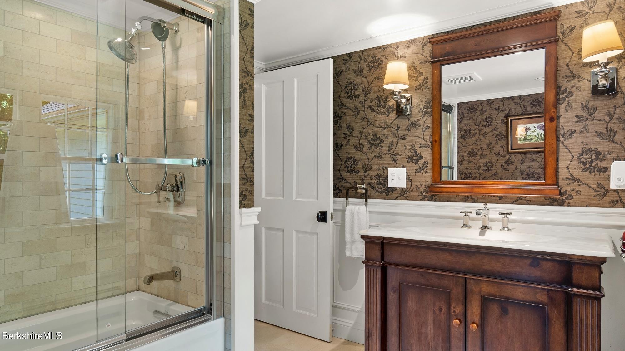 500 Devon Road Lee, MA 01238 - Photo 56 of 59 a bathroom with a shower sink and mirror