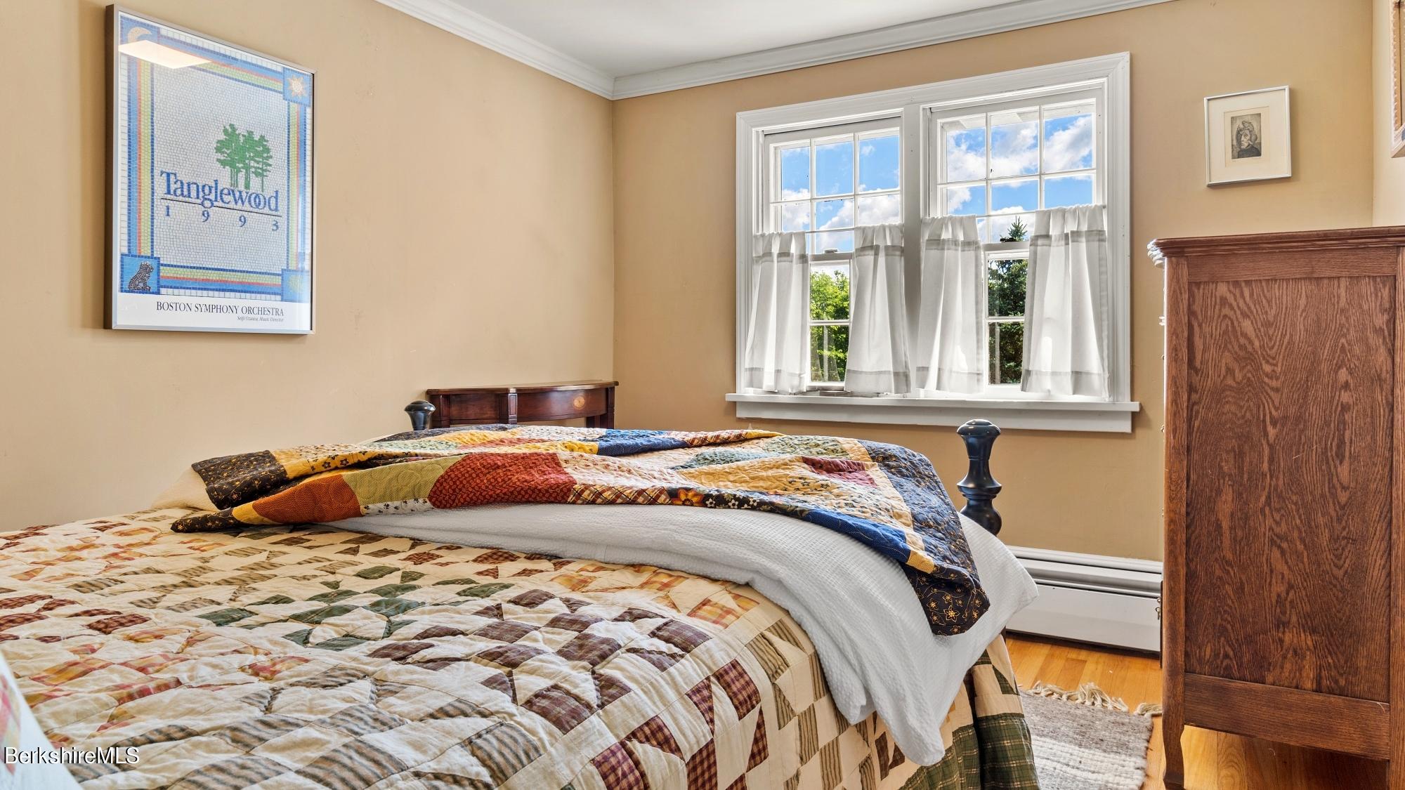 500 Devon Road Lee, MA 01238 - Photo 57 of 59 a bedroom with a bed and a window