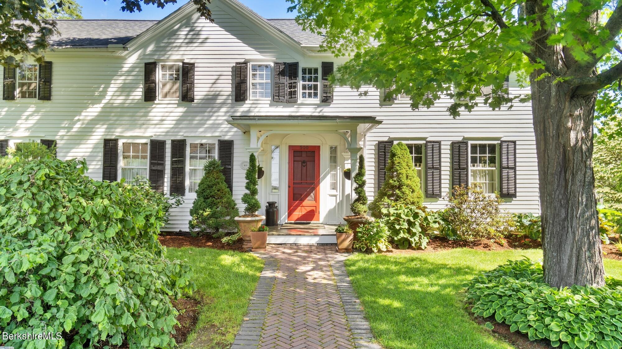 500 Devon Road Lee, MA 01238 - Photo 9 of 59 front view of a house with a yard