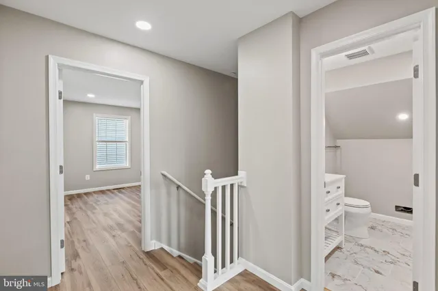 a view of bathroom with a toilet and a shower