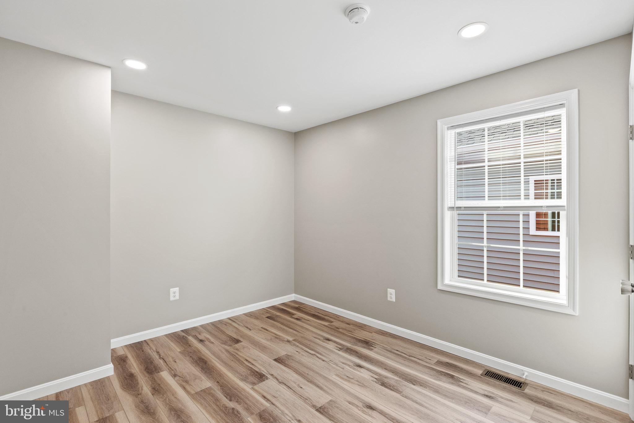 41599 Church Street Leonardtown, MD 20650 - Photo 15 of 22 a view of an empty room with a window