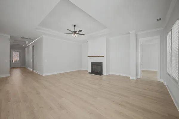a view of a livingroom with a kitchen