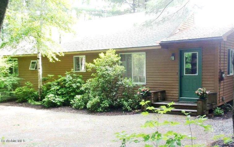 155 Bonny Rigg Hill Road Becket, MA 01223 - Photo 1 of 21 a front view of a house with a yard