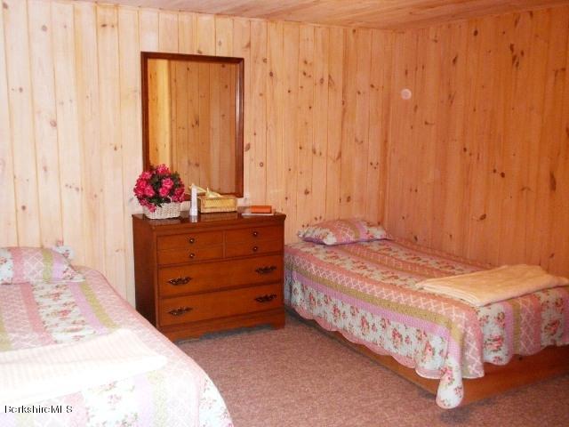 155 Bonny Rigg Hill Road Becket, MA 01223 - Photo 18 of 21 a bedroom with a bed and a dresser